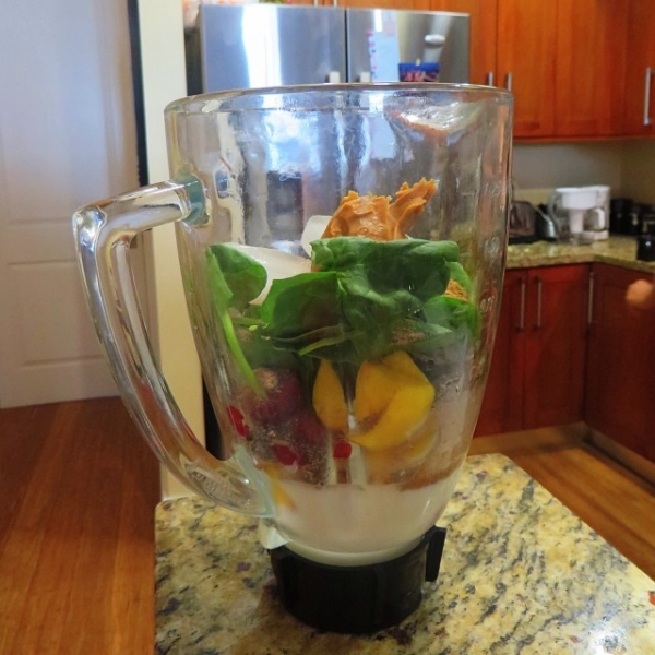 Lunch in a blender :) Fruit, spinach, flax seed, chia seeds, protein powder, peanut butter
